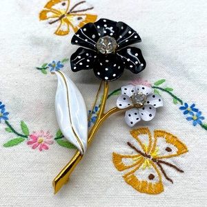 Elegant Black and White Floral Brooch